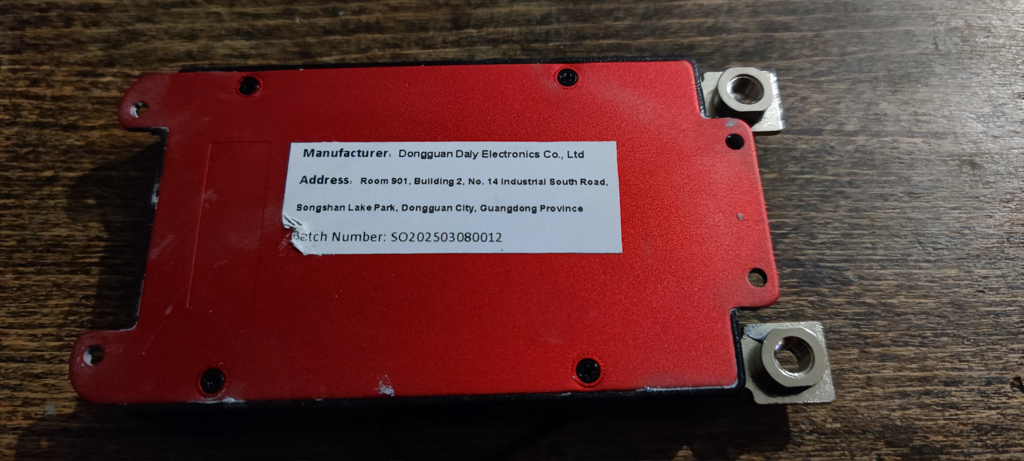 Bottom side, thermal paste applied under the cover.