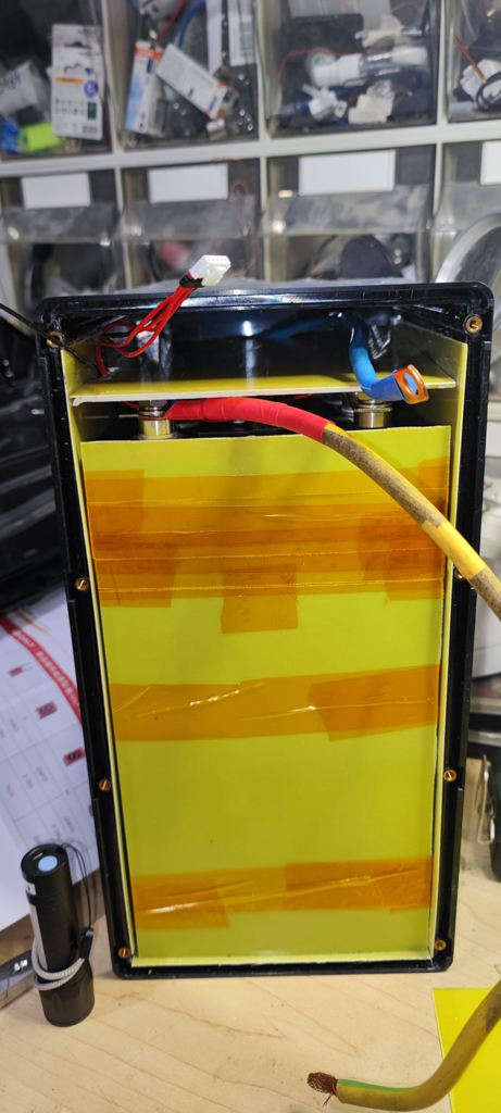 Put all insulation boards bellow, on the sides and on the top of the battery.