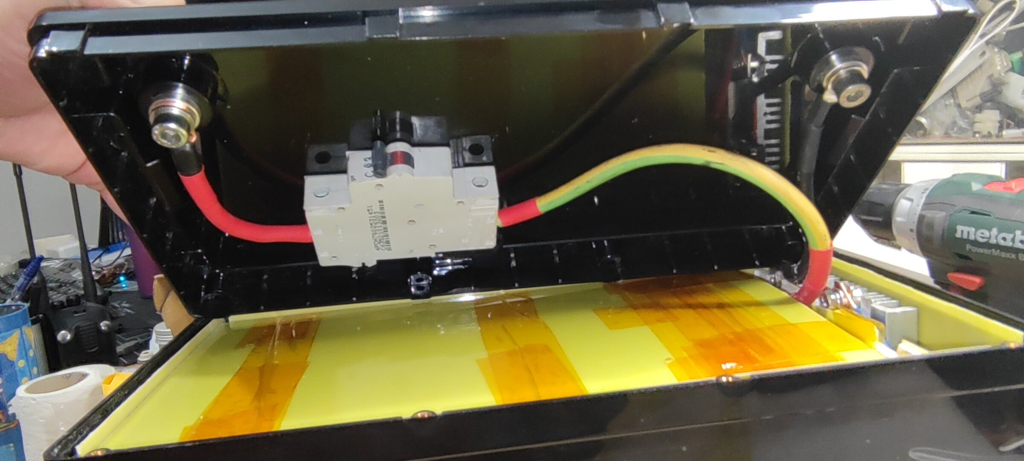 I installed C-Type  63A fuse in series with battery plus and box  plus terminal. I had one laying around so I used it, it will do its job in case of a overload or short circuit, and I do not need bigger currents than 50 Amps anyway.